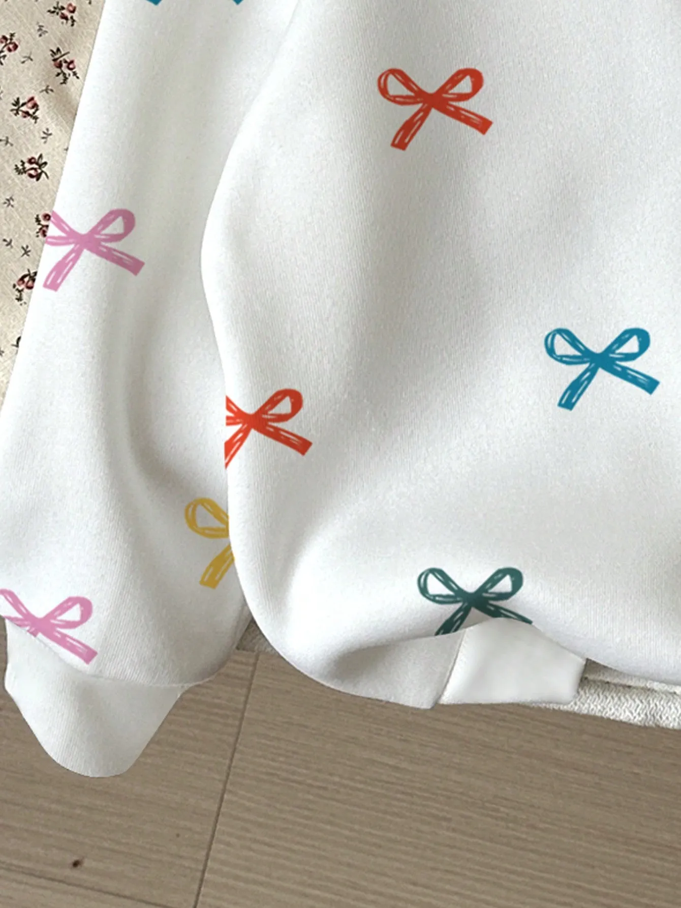 EZwear Casual Simple Allover Bow Print Hoodie Sweatshirt